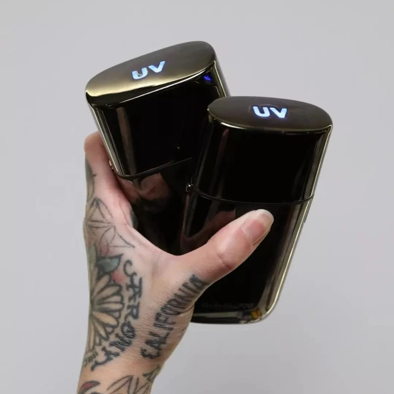 Rasoir métallique à lames unique "UVFoil" avec lumière UV désinfectante - Titane noir