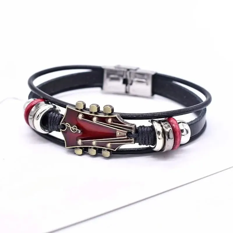 MUSIKSTRUM – Bracciale in pelle con design ispirato alle chitarre