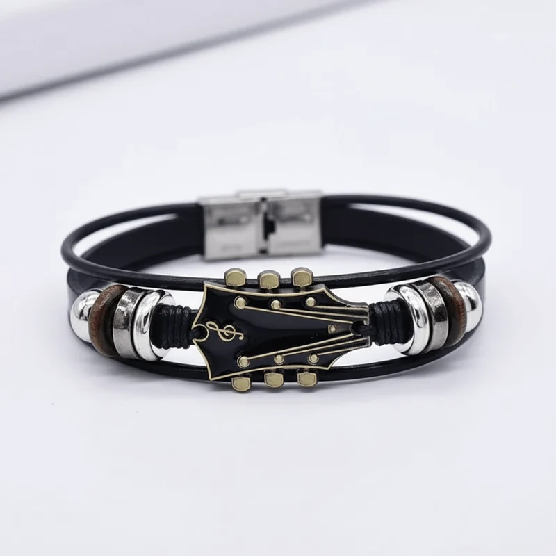 MUSIKSTRUM – Bracciale in pelle con design ispirato alle chitarre